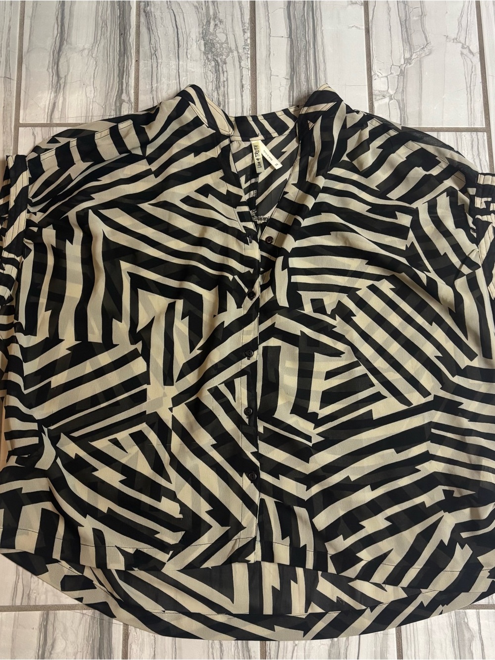 Black and Cream Geometric Button-Up Blouse